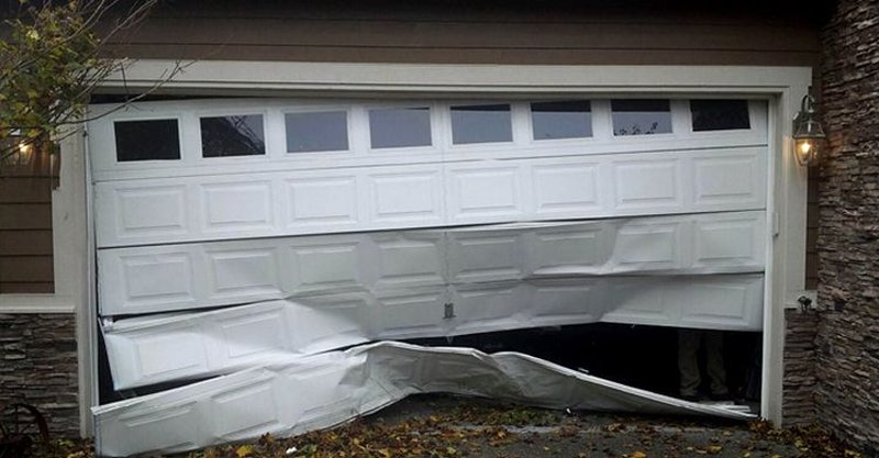 Damaged White Garage Door Panel Replacement ,  24/7 Garage Door and Gate Services, Inland Empire CA