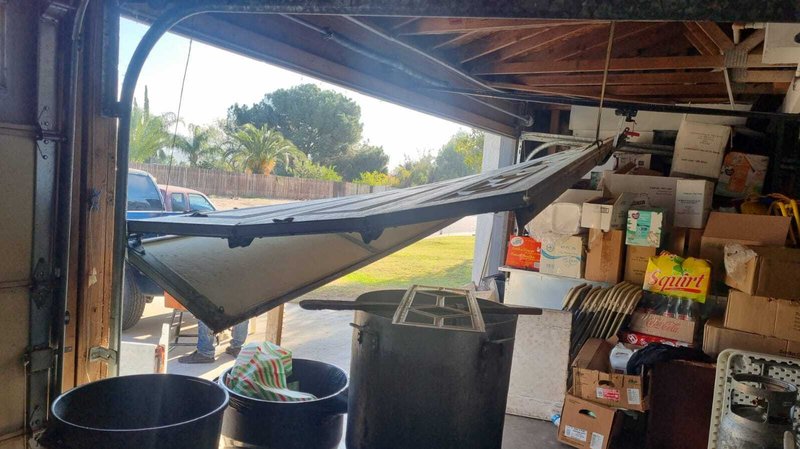 Collapsed Sectional Garage Door Emergency Repair ,  24/7 Garage Door and Gate Services, Inland Empire CA