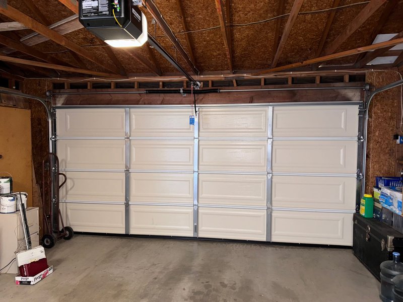 Cream Long-Panel Sectional Garage Door Installation ,  24/7 Garage Door and Gate Services, Inland Empire CA