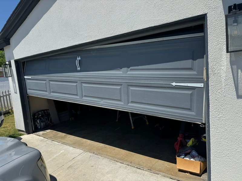 Gray Sectional Garage Door Off-Track Repair ,  24/7 Garage Door and Gate Services, Inland Empire CA