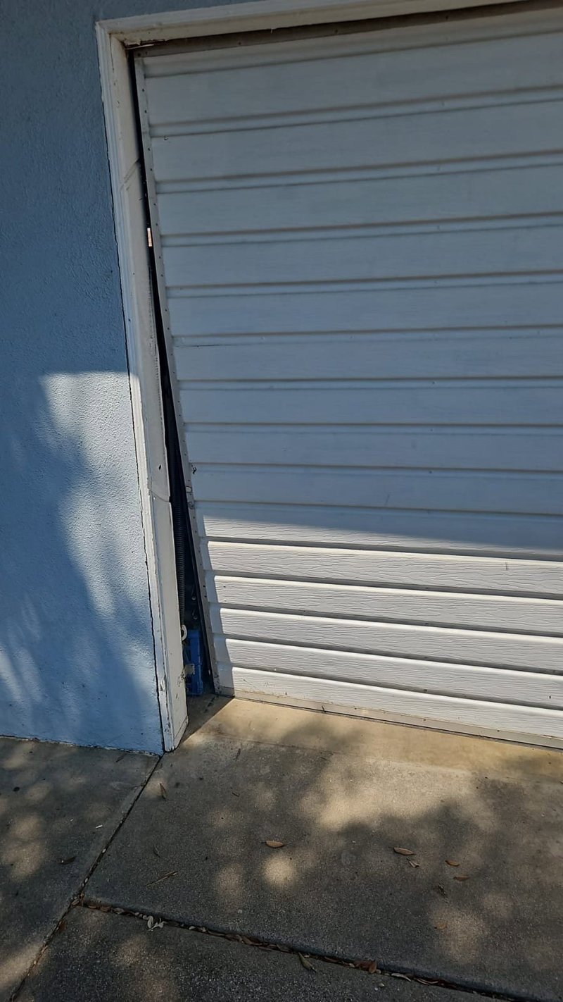 White Roll-Up Garage Door Spring Repair ,  24/7 Garage Door and Gate Services, Inland Empire CA
