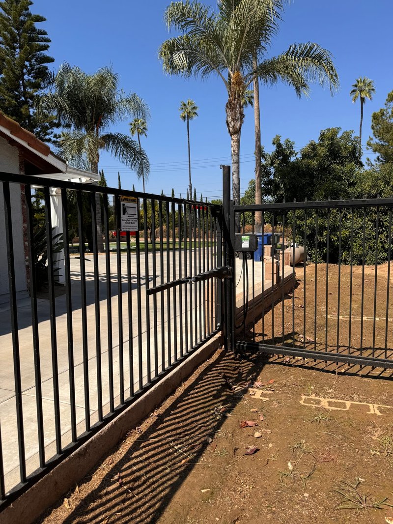 Black Iron Sliding Driveway Gate ,  24/7 Garage Door and Gate Services, Inland Empire CA