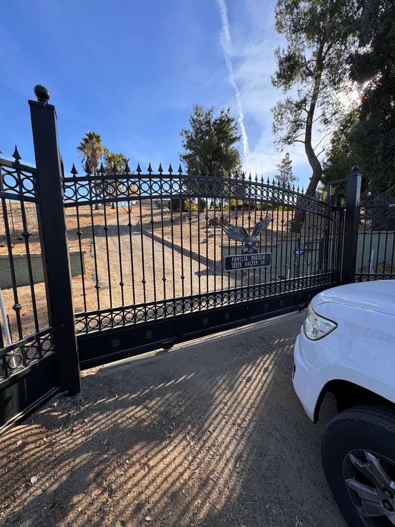 Black Ornamental Iron Sliding Gate ,  24/7 Garage Door and Gate Services, Inland Empire CA
