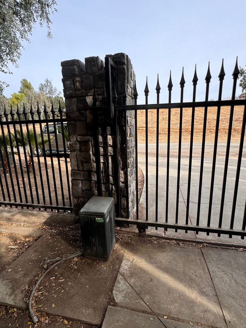Spear-Top Iron Gate With Operator And Stone Columns ,  24/7 Garage Door and Gate Services, Inland Empire CA