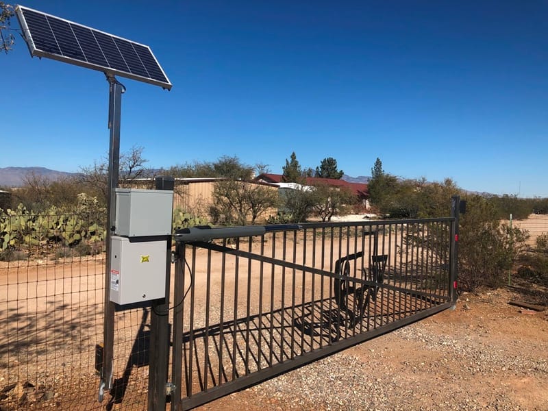 A tall automatic driveway gate with a new opener in Hemet, California